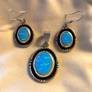 Beautiful Sterling silver and Opal Necklace with matching earrings.